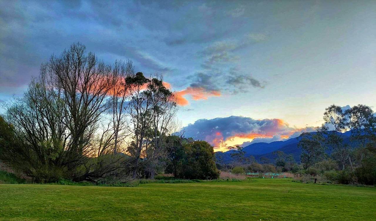 Sunset over the ranges, seen across the lawn